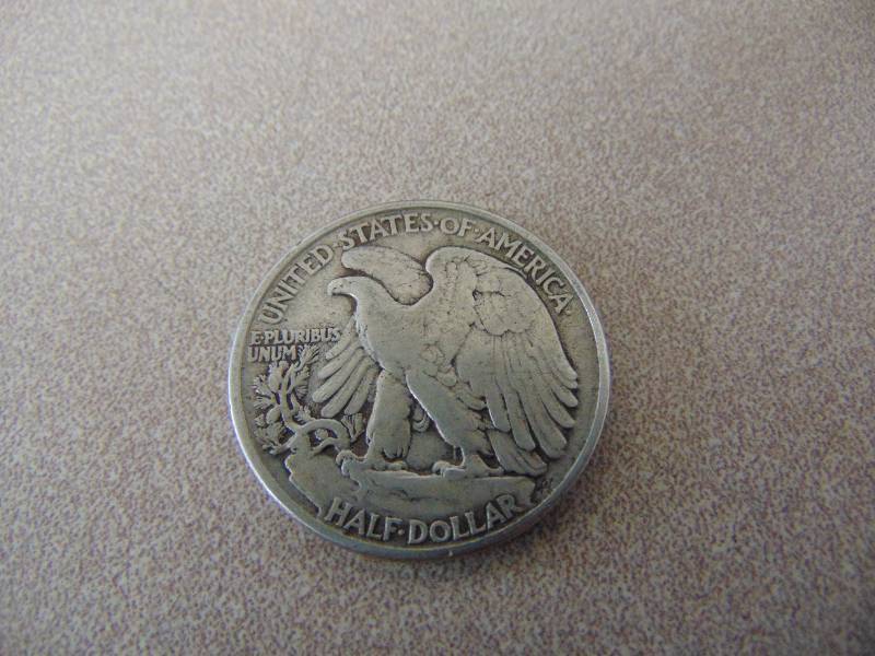 lot 228 image: (1) Silver Half Dollar