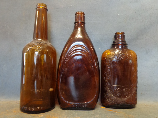 lot 49 image: Vintage Brown Glass Bottles