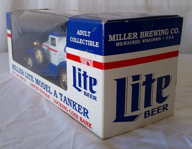 lot 24 image: (2 of 3 Collectible Banks) Lite Model A Tanker Bank