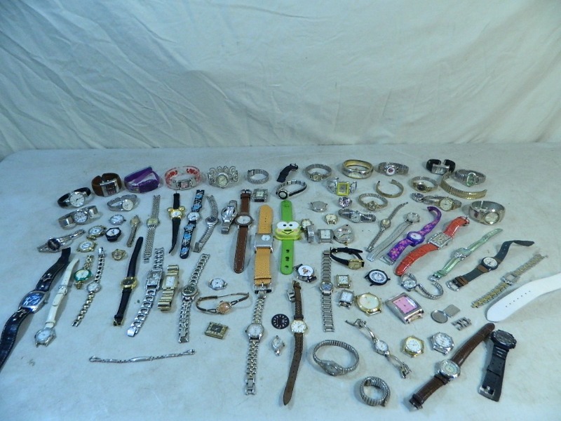 lot 12 image: Huge Assortment of Watches and More