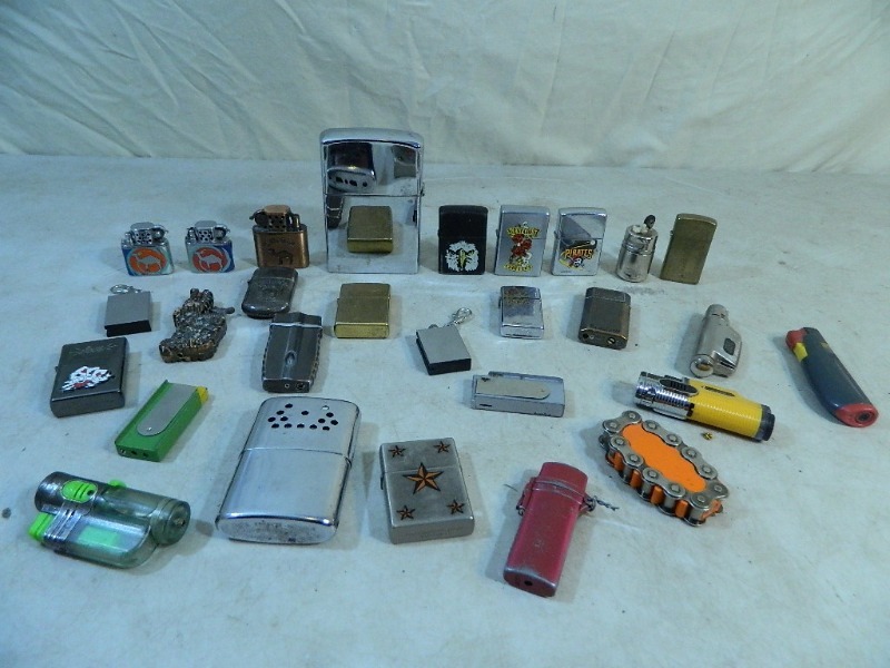 lot 14 image: Zippos, Lighters, More