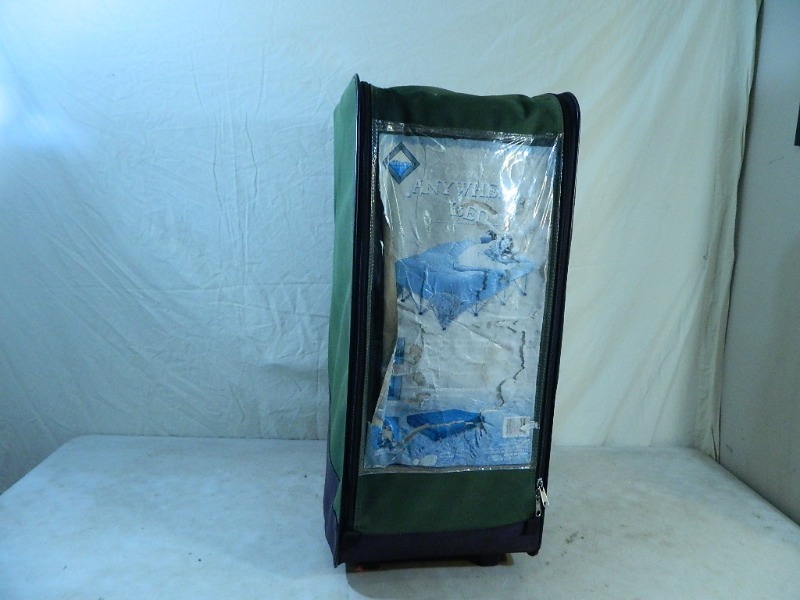 lot 52 image: Anywhere Bed in Rolling Case