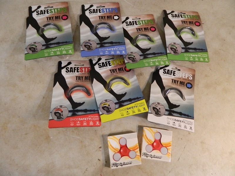 lot 102 image: New Safe Steps and LED Fidget Spinners