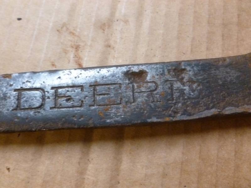lot 48 image: Antique Deere Wrench