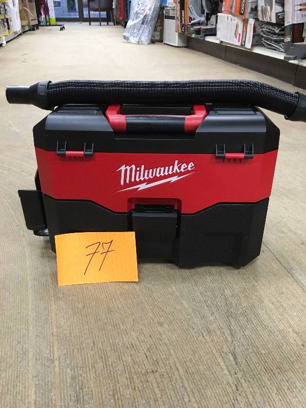 lot 77 image: Milwaukee M18 WetDry Handheld Vacuum - Bagless - HEPA never used in box