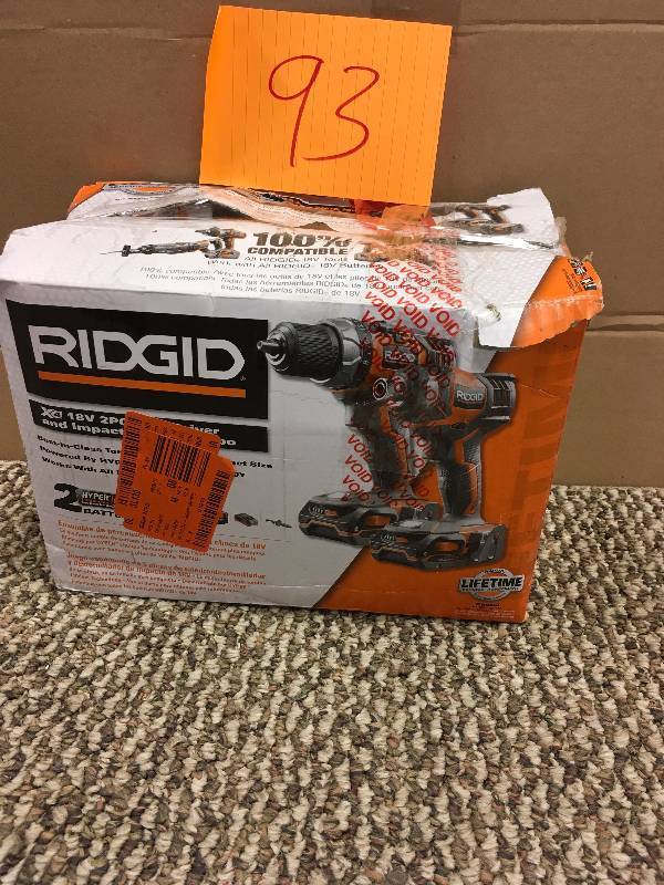lot 93 image: Ridgid 18-Volt Drill And Impact Driver Kit, Multicolor used in good condtion MSRP $240