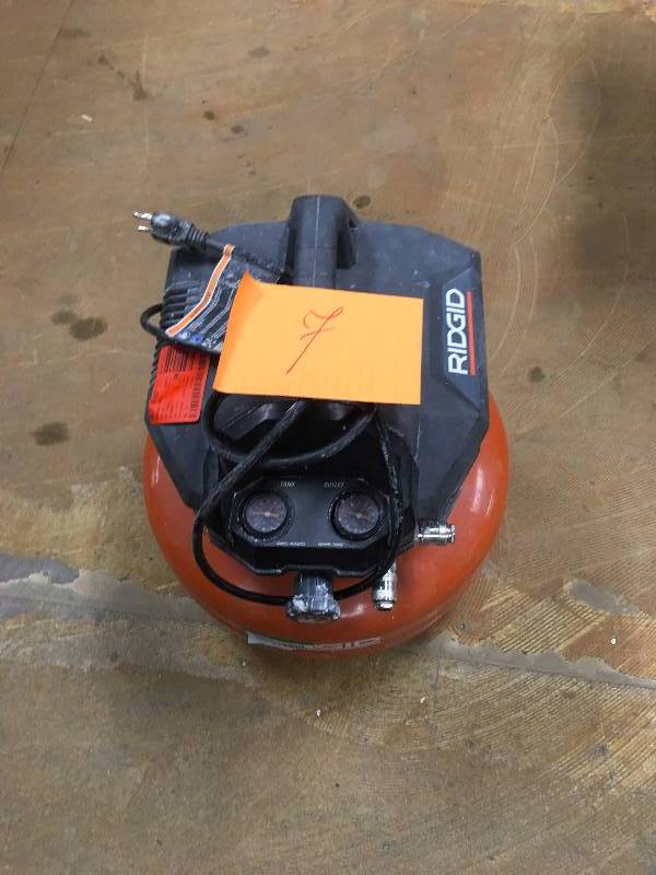 lot 7 image: RIDGID 6 Gal. Portable Electric Pancake Compressor 150psi used in good working condition