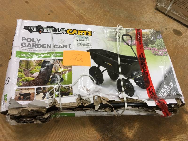 lot 22 image: Gorilla Carts Poly Garden Dump Cart with Steel Frame and Pneumatic Tires, 600-Pound Capacity, Black never used in box
