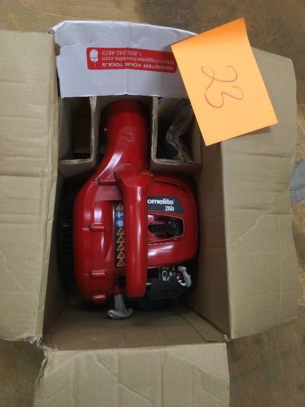 lot 23 image: Homelite Leaf Blower 150 MPH 400 CFM 2-Cycle Handheld Gas in box, in good working condition