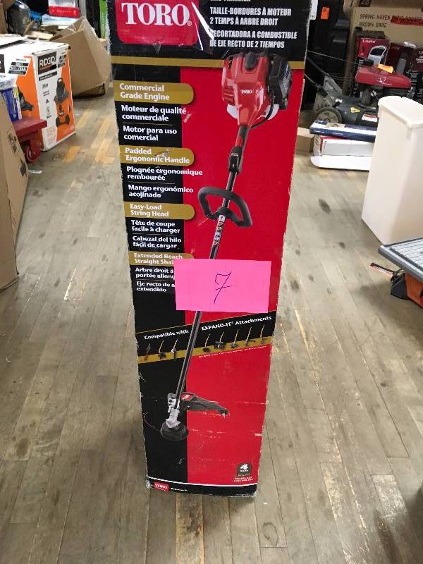 lot 7 image: Toro 2-Cycle 25.4cc Attachment Capable Straight Shaft Gas String Trimmer