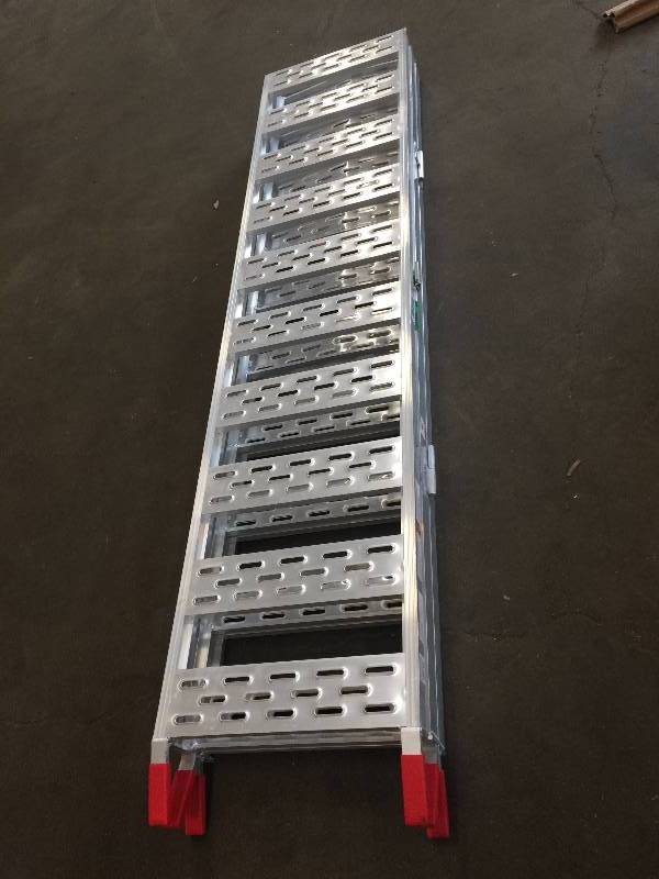 lot 8 image: CargoSmart 50 in. W x 77 in. L Aluminum Tri-Fold Ramp with not Treads, 1500 lb. Capacity open box never used Model # 3075