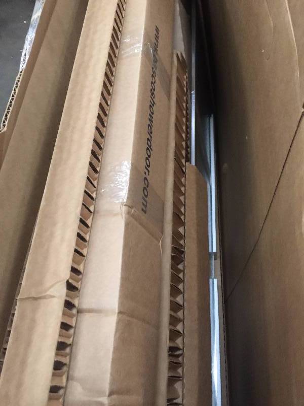 lot 13 image: Basco Deluxe 27-12 in. x 67-58 in. Framed Neo-Angle Shower Door in Silver open box never used