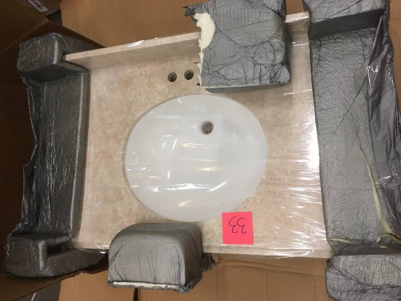 lot 33 image: Home DEcorators 31 in. Stone Effects Vanity Top in Oasis with White Bowl