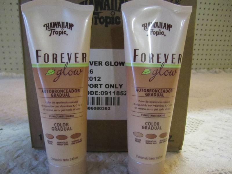 lot 9 image: Case of 12 Hawaiian Tropic Forever ...