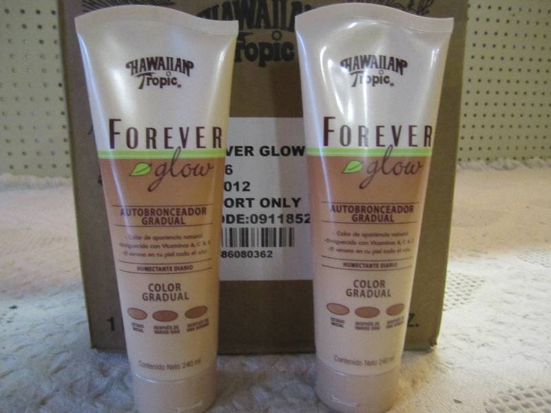 lot 10 image: Case of 12 Hawaiian Tropic Forever ...