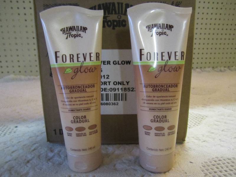 lot 11 image: Case of 12 Hawaiian Tropic Forever ...