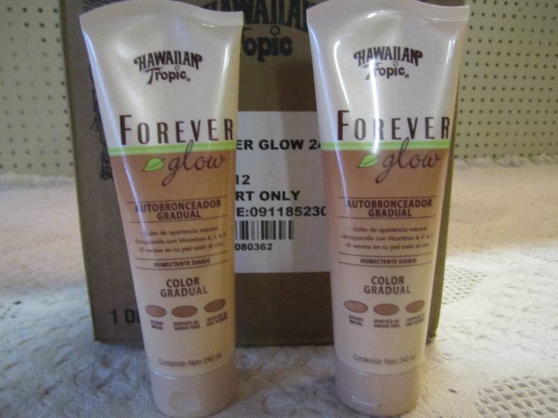 lot 12 image: Case of 12 Hawaiian Tropic Forever ...