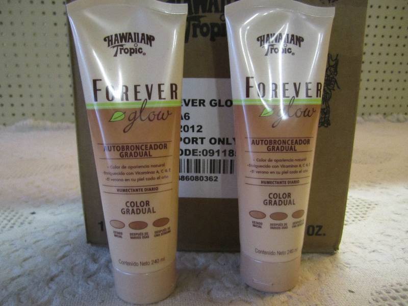 lot 13 image: Case of 12 Hawaiian Tropic Forever ...