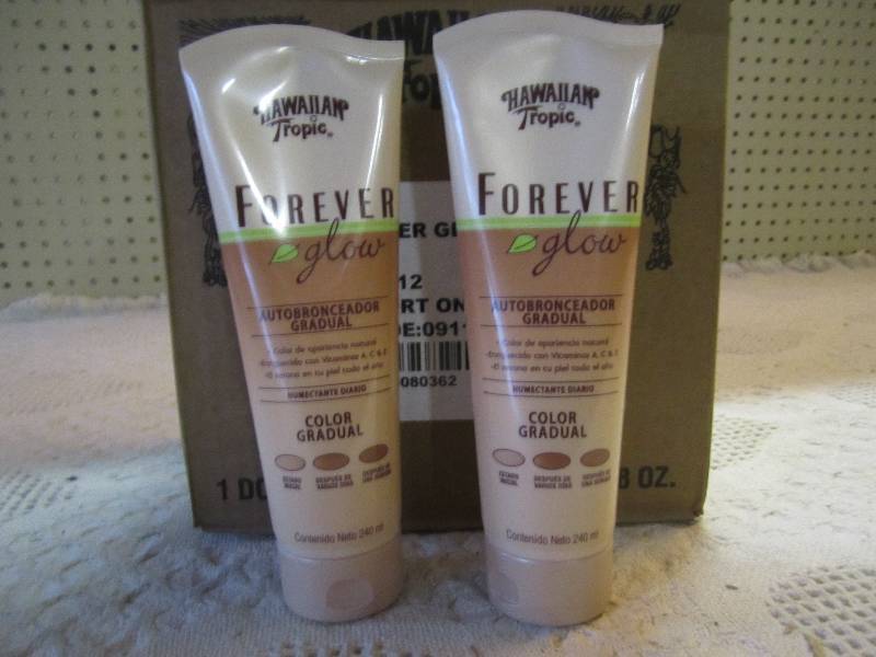 lot 14 image: Case of 12 Hawaiian Tropic Forever ...