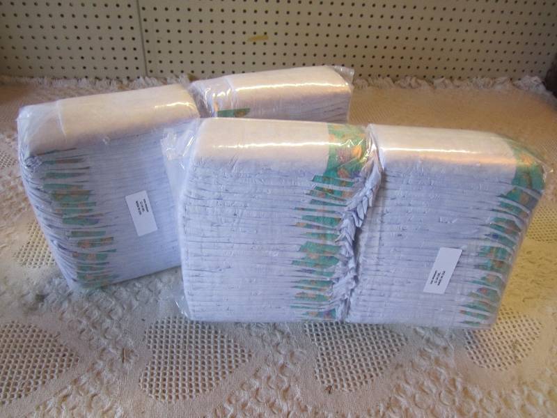 lot 83 image: Lot of 100 Size Medium Diapers 12-2...
