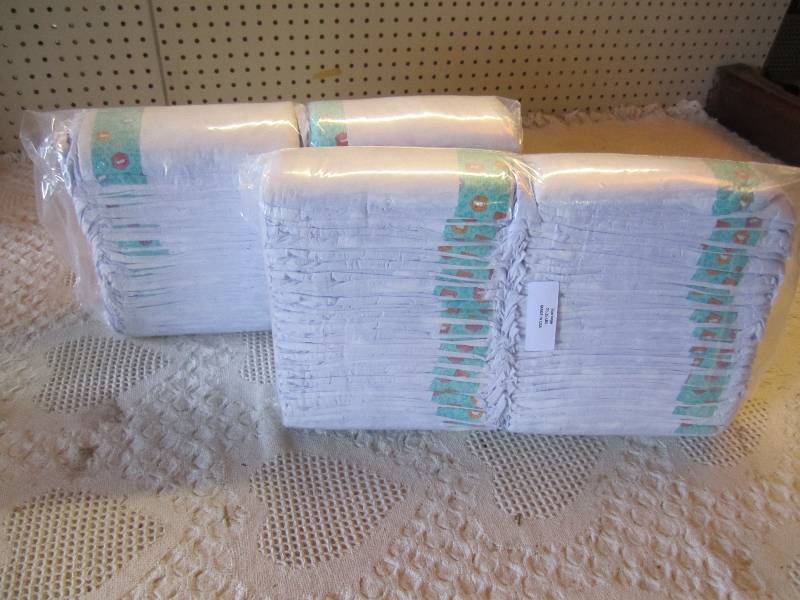 lot 84 image: Lot of 100 Size Large Diapers 21-35...