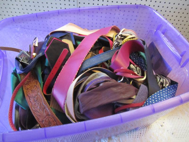 lot 118 image: 78 quart Tote Full of Belts Scarves...