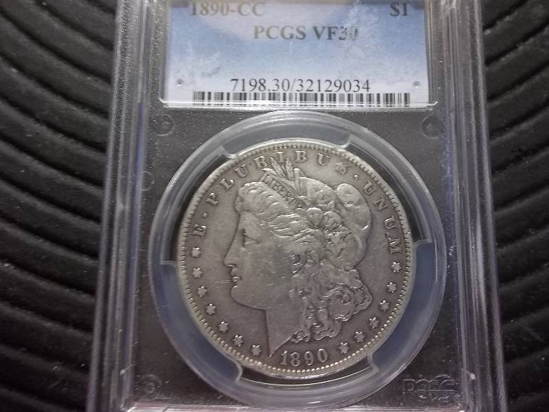 lot 4 image: 1890 CC  Morgan Silver Dollar
