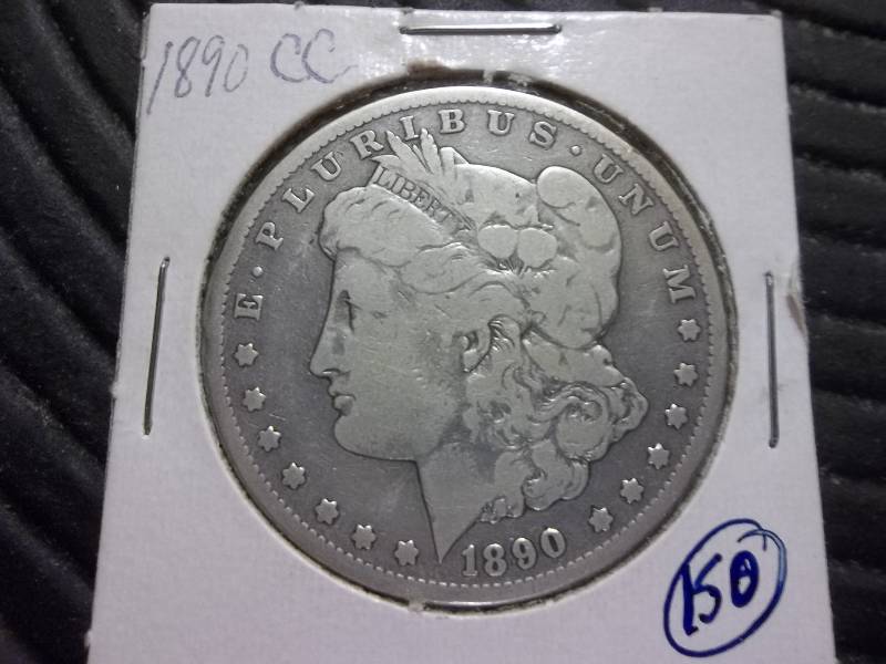 lot 5 image: 1890 CC  Morgan Silver Dollar