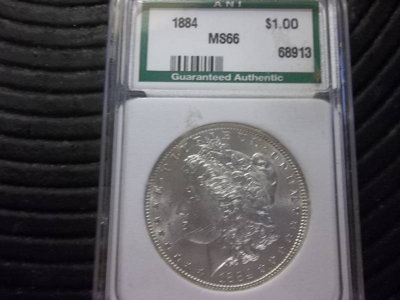 lot 12 image: 1884  Morgan Silver Dollar