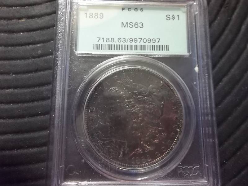 lot 18 image: 1889 Morgan Silver Dollar