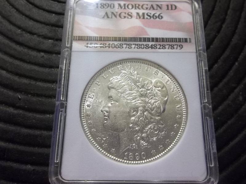 lot 19 image: 1890 Morgan Silver Dollar