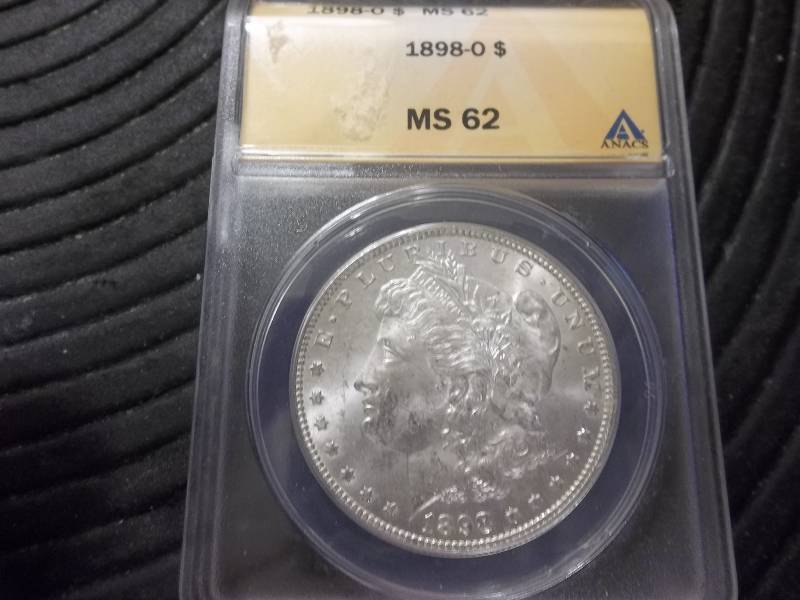 lot 21 image: 1898 O Morgan Silver Dollar