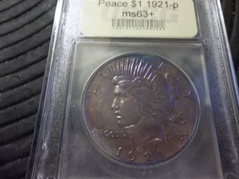 lot 31 image: 1921 Peace Silver Dollar