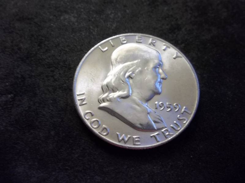 lot 129 image: 1959 D Franklin Half Dollar