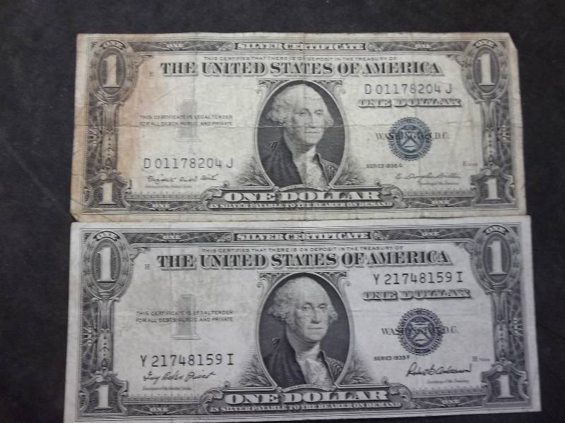 lot 142 image: 2-US One Dollar Silver Certificates Series 1935 F & G