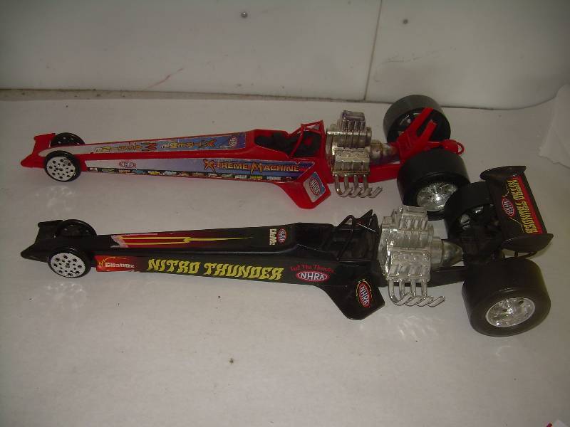 2 COLLECTIBLE NITRO THUNDER CARS
