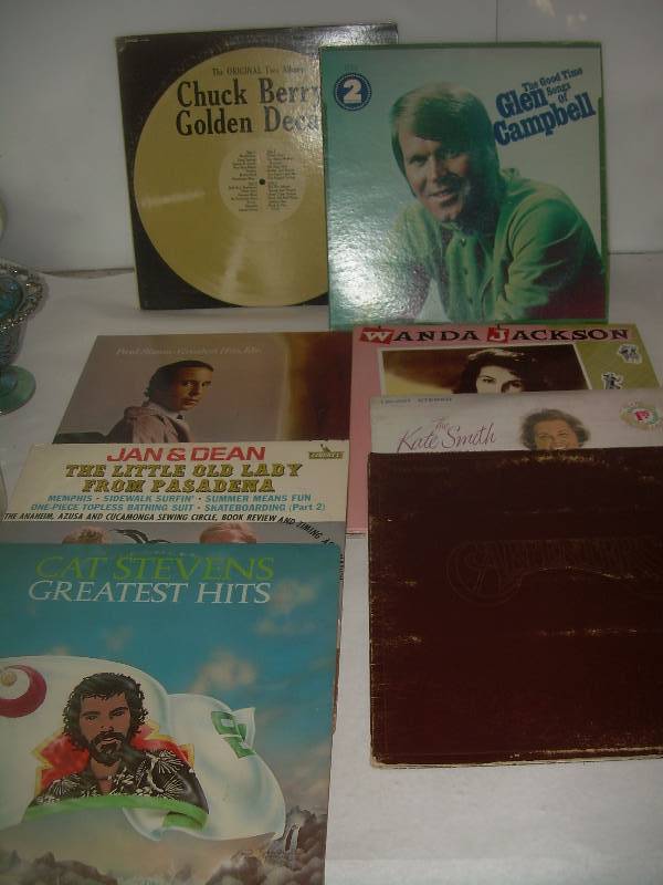 8 COLLECTIBLE RECORDS