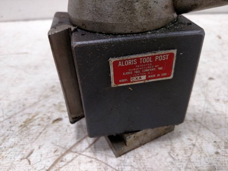 lot 64 image: Aloris CXA Tool Post with (5) Tool ...