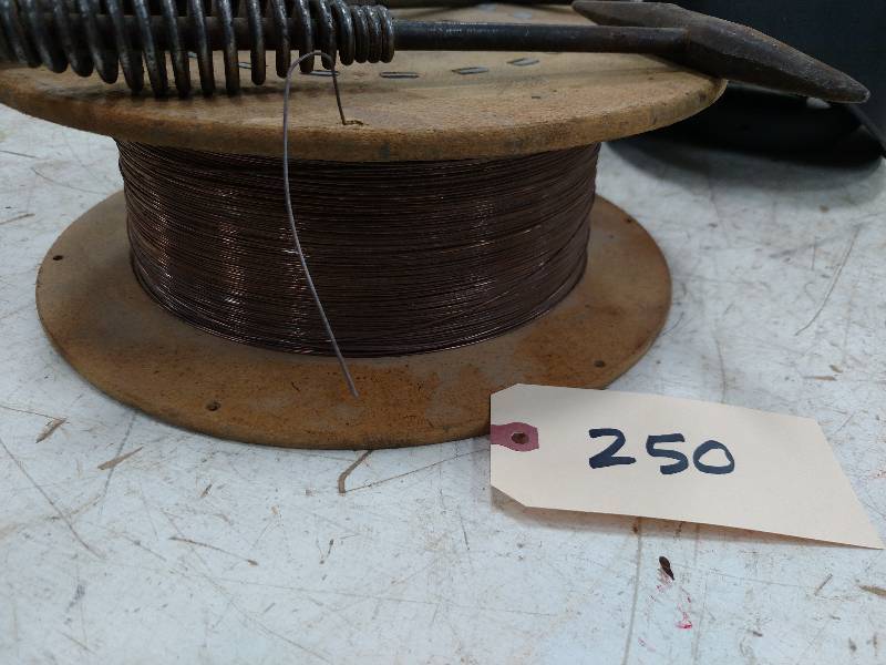 lot 250 image: .035 Welding Wire, (2) Hoods, & (3)...