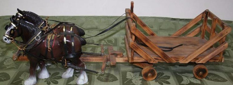 lot 25 image: Horses and Hay Wagon Figure