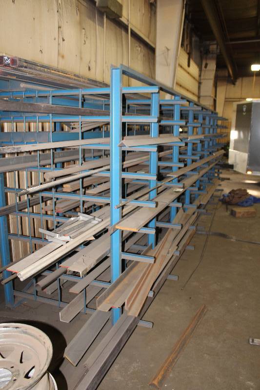 lot 304 image: Contents of Rack - Steel Pipe, Posts, Angle Brackets, And More