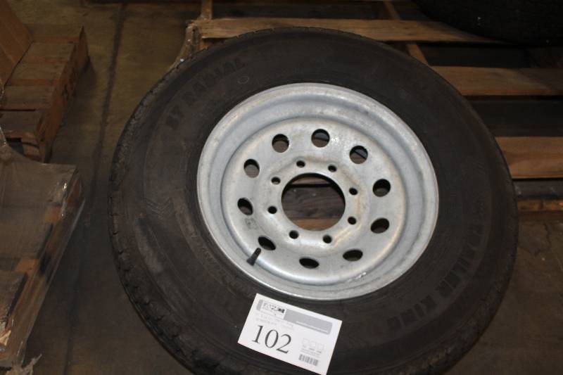 lot 102 image: Trailer King ST23580R16 Tire w 8-Lug 16in. Wheel