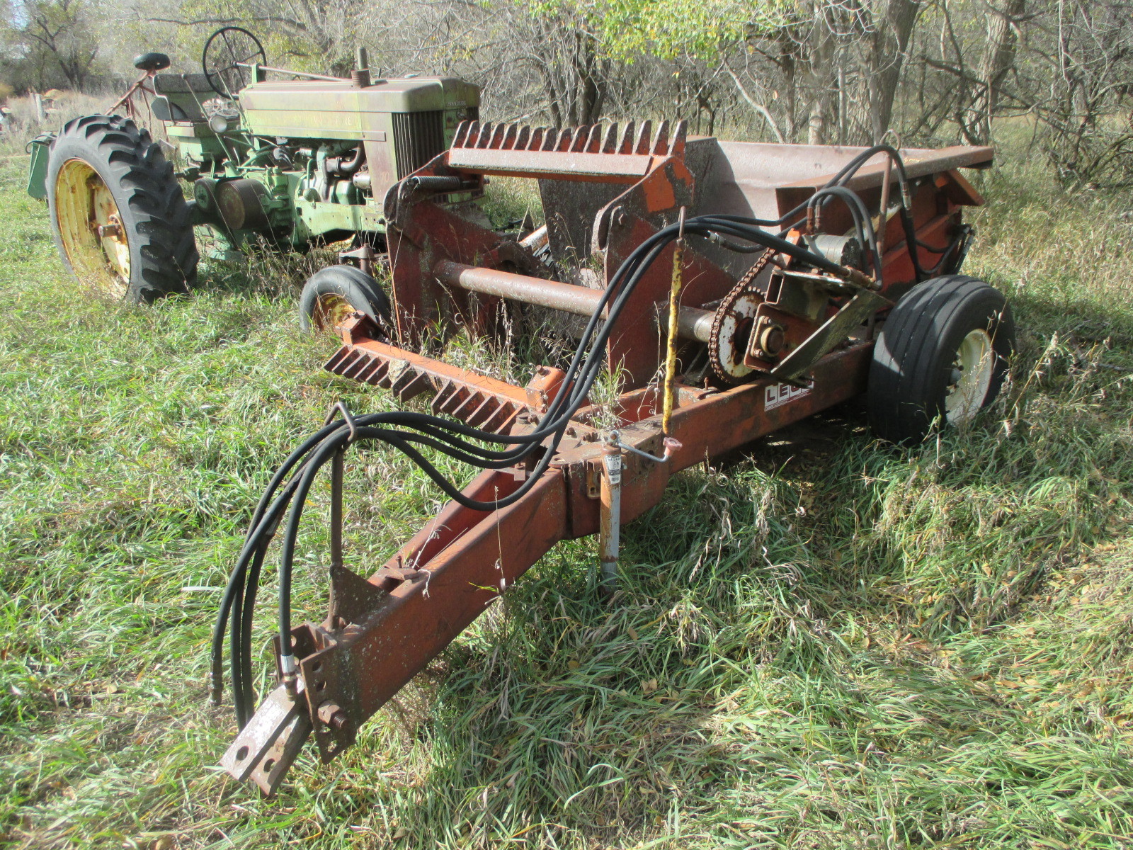 lot 93 image: Leons Mfg Rock Picker