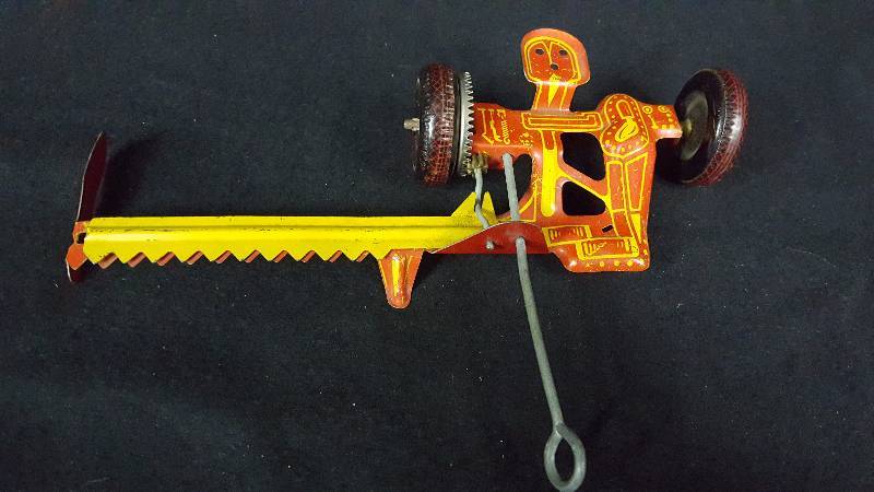 lot 283 image: Tin Toy Sickle Mower