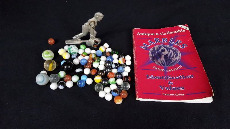 lot 314 image: Glass Marbles & Thrower