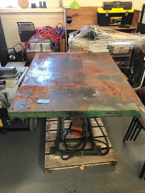 lot 106 image: POWERED LIFT TABLE