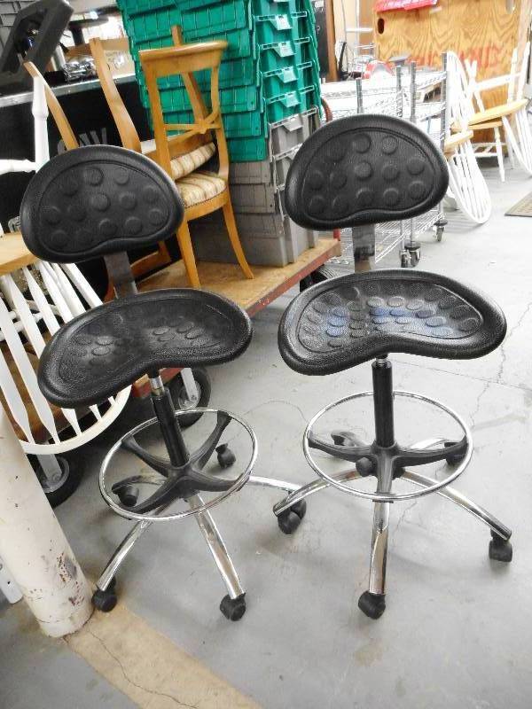 lot 142 image: HARD RUBBER ROLLING STOOLS