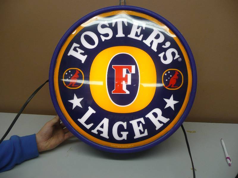 lot 9 image: VINTAGE FOSTERS LAGER DOUBLE SIDED BEER LIGHT - CEILING MOUNT - WORKS - NICE LIGHT APPROX 19IN ROUND - SEE PICTURES