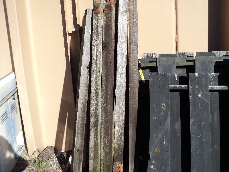 lot 4 image: 11 gray weathered fence posts, 6ft ...