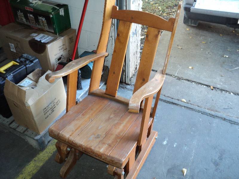 lot 8 image: wood rocking chair...